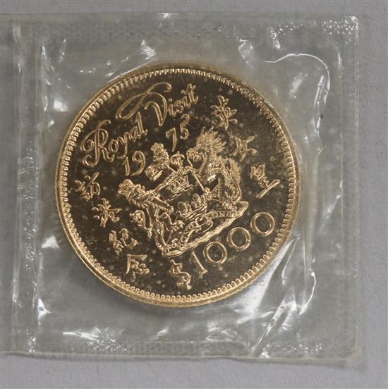 A Hong Kong Royal Visit 22ct gold $1000 commemorative coin